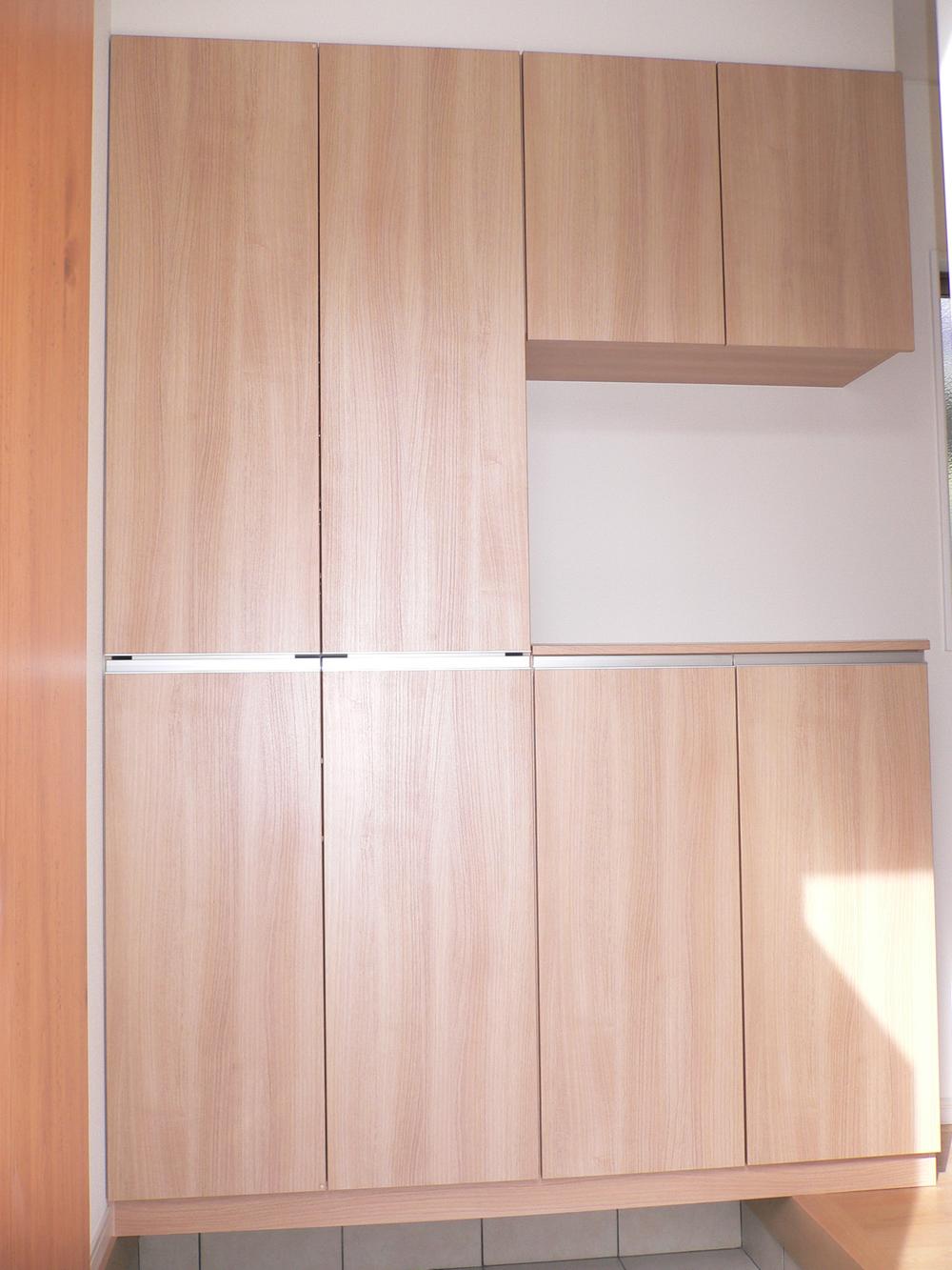 Entrance. Entrance storage that is housed a lot of shoes