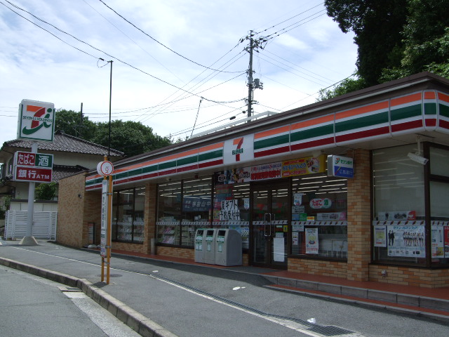 Convenience store. Seven-Eleven Hiroshima Hesakaminami store up (convenience store) 1065m