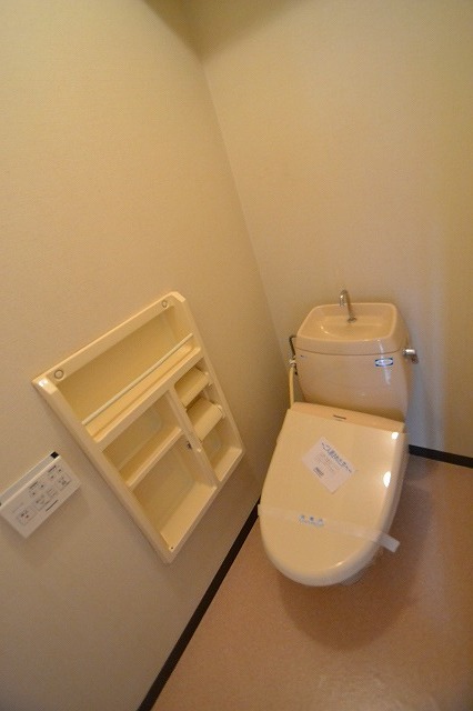 Toilet.  ☆ It is convenient shelf of the wall ☆