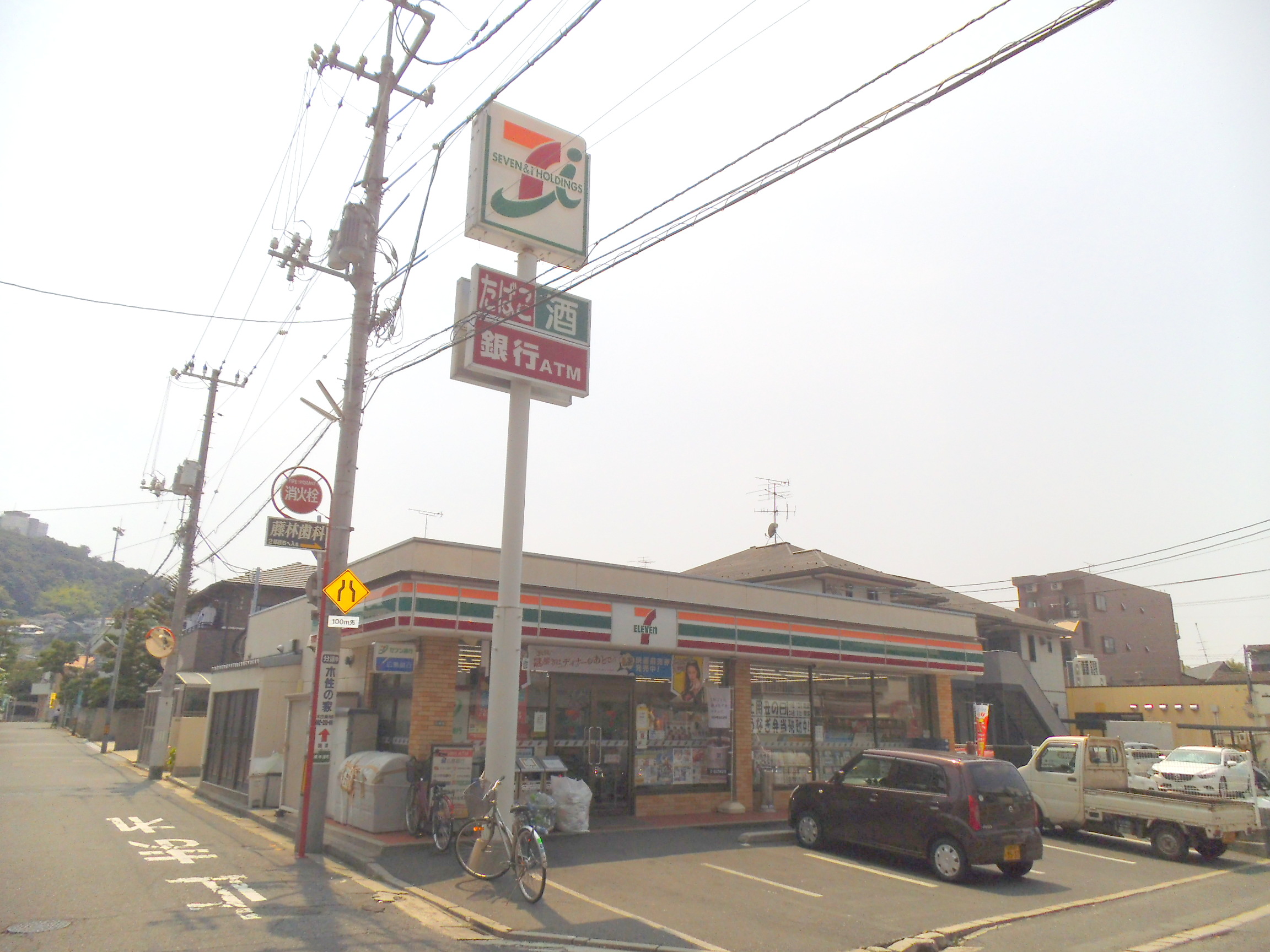 Convenience store. Seven-Eleven Higashihon'ura store up (convenience store) 243m