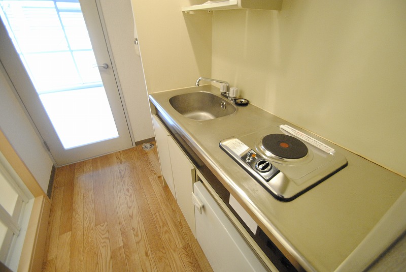 Kitchen. It is with a mini-fridge in the kitchen