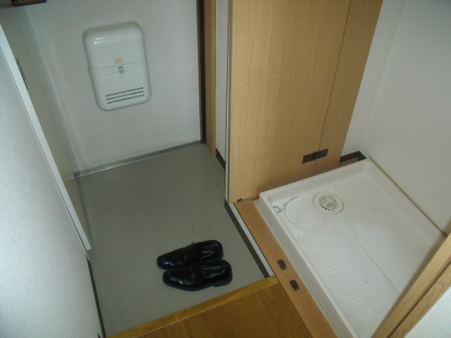 Other Equipment. Washing machine is placed indoor.