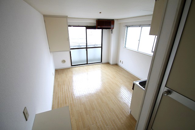 Living and room. Bright your rent reasonable in the corner room!