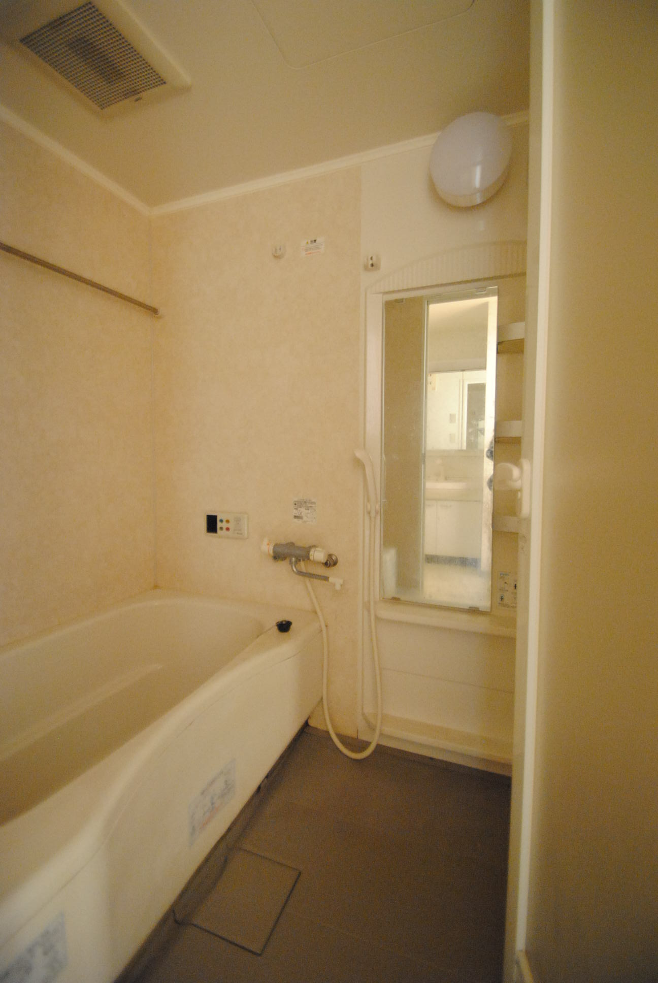 Bath. A bathroom with a mirror