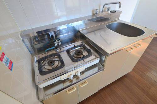 Kitchen. Two-burner gas stove with kitchen