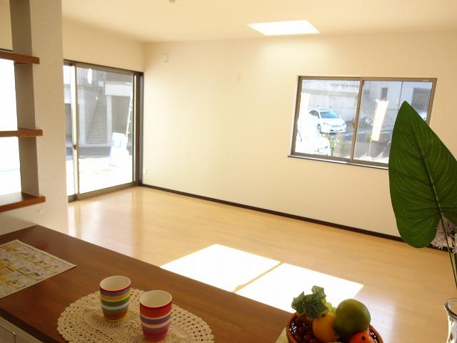 Living. Bright and spacious living room there is a skylight! Living overlooks may be from the kitchen