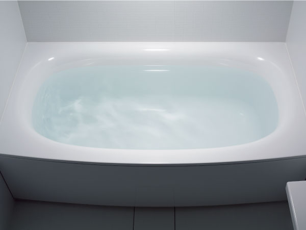 Bathing-wash room.  [Arcuate tub] Tub of bow shape that eliminates the inner edge, Loose and gently wrapped Komu design the body. While showing a wide bathtub, Washing place can also be used widely.