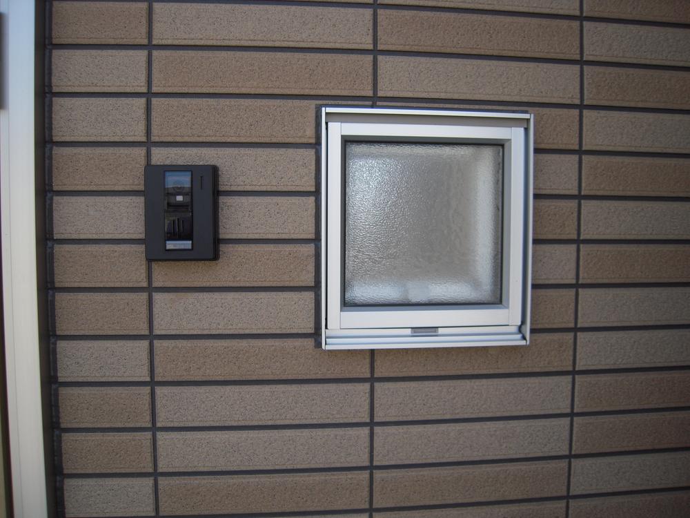 Local appearance photo. Intercom and a small window