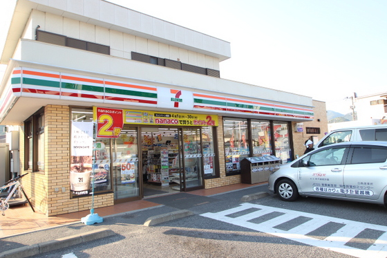 Convenience store. Seven-Eleven Otake Inter store up (convenience store) 398m