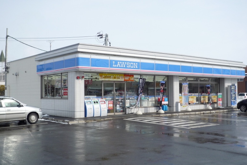 Convenience store. 411m until Lawson Asahikawa Toyooka Article 12 1-chome (convenience store)