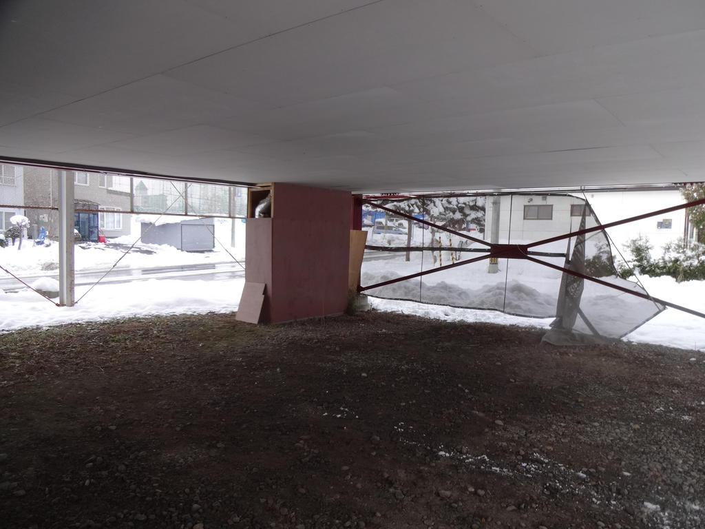 Parking lot. Housing under we become carport