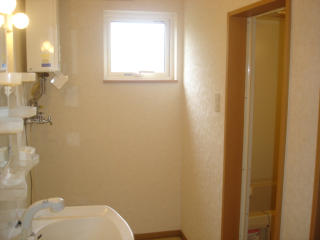 Washroom. It is bright with window! 