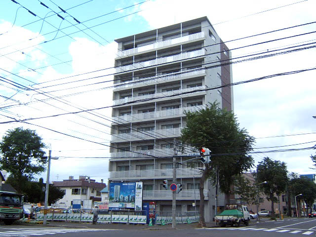 Building appearance. High-rise designer's apartment