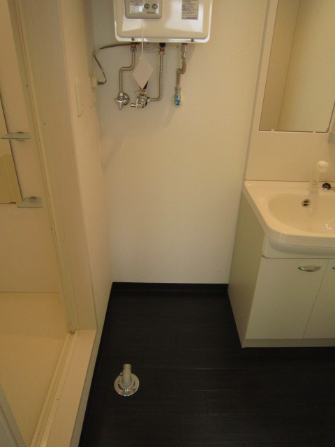 Washroom. Interior image is a photo. 