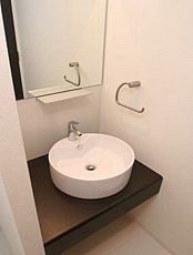 Washroom. It is a stylish bathroom vanity. 