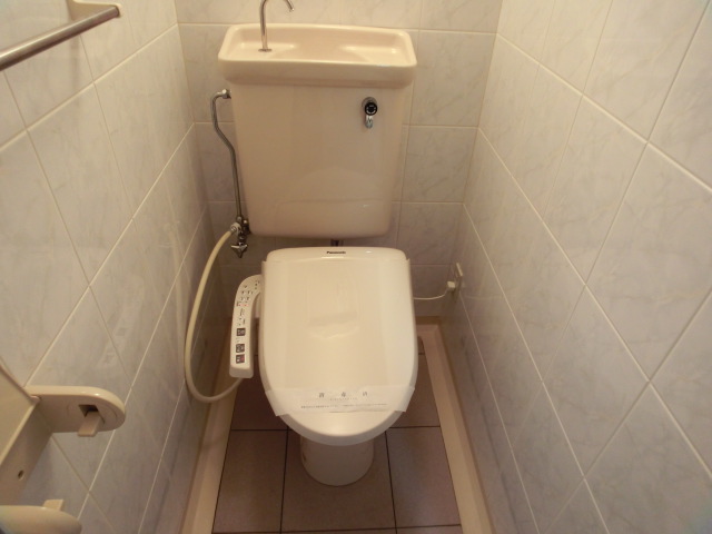 Toilet. Warm water washing toilet seat. 