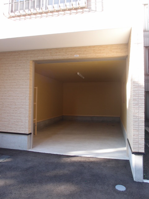 Parking lot. It is with a separate garage! Also it comes with storage shelves! ! 