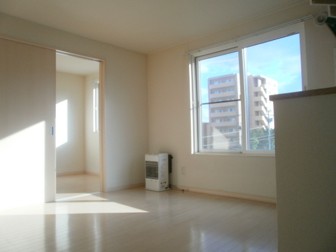 Living and room. White wallpaper to more brightly