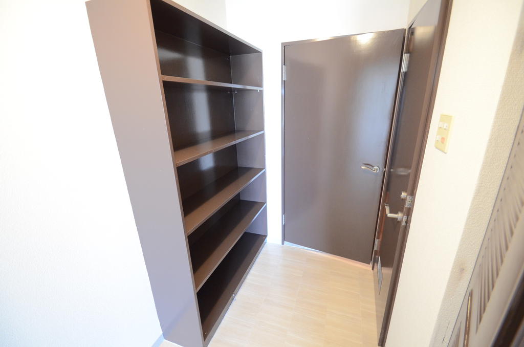 Toilet. In the hallway, Storage rack, Book, Accessory, It can also be used as a display shelf. 