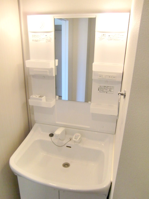 Washroom. It is with shampoo dresser