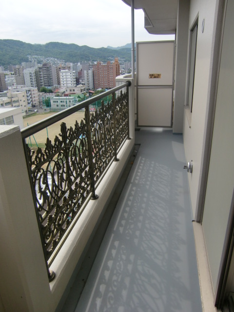 Balcony. The photograph is the upper floors