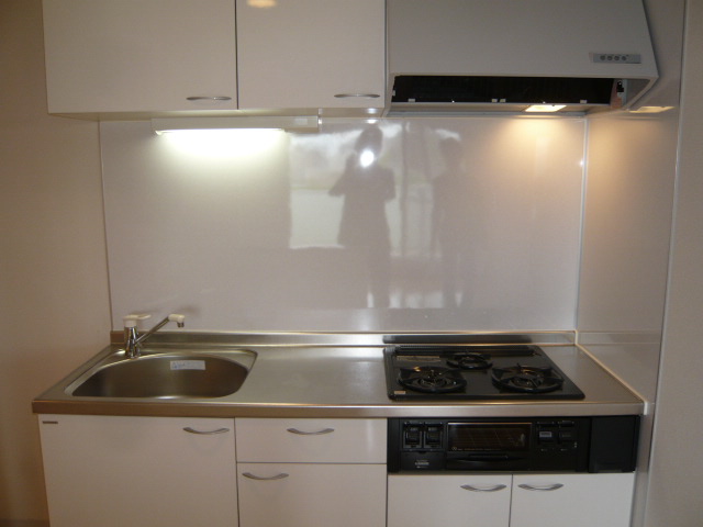 Kitchen. 3-burner stove in the kitchen! 