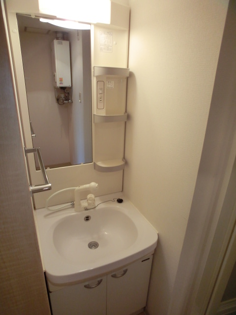 Washroom. It is with the dresser shower. 