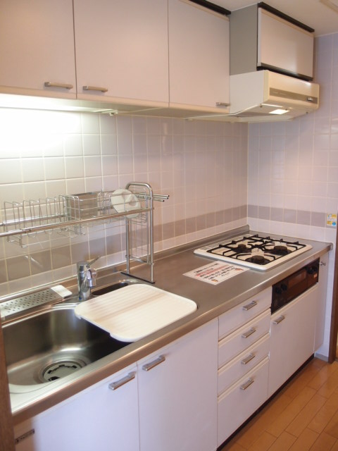 Kitchen. Spacious independent kitchen space! This is a system kitchen with grill