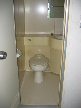 Toilet. 3-point unit toilet