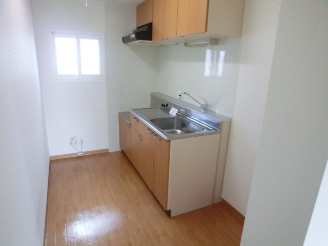 Kitchen. Bright and spacious kitchen space has a window