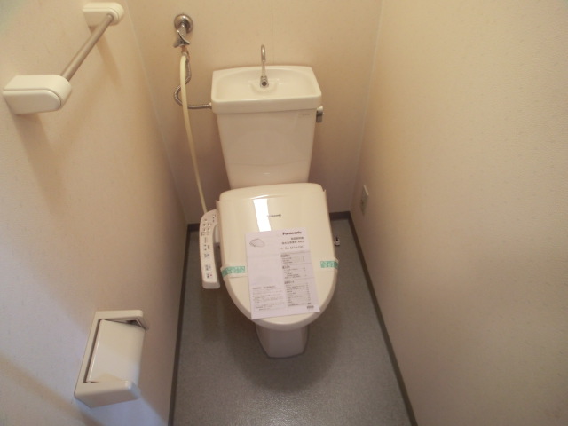 Toilet. It is with warm water washing toilet seat! 