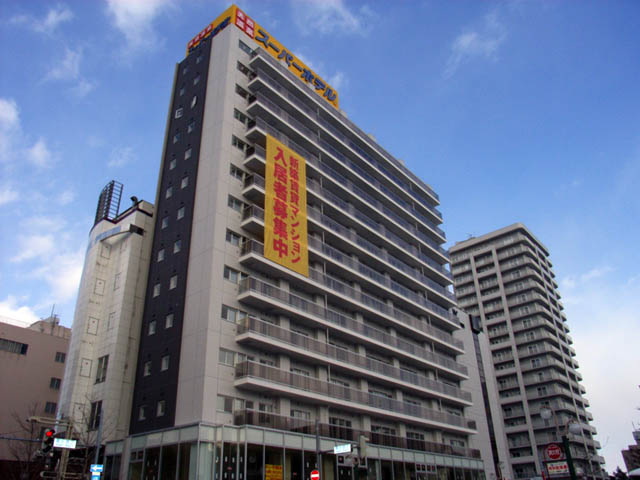 Building appearance. South-facing balcony may be a day on the road across the street