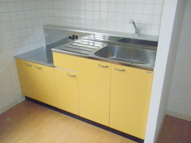 Kitchen. Yellow is a nice kitchen