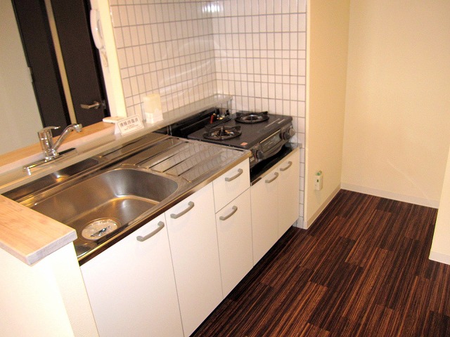 Kitchen. It is a gas stove with a separate kitchen