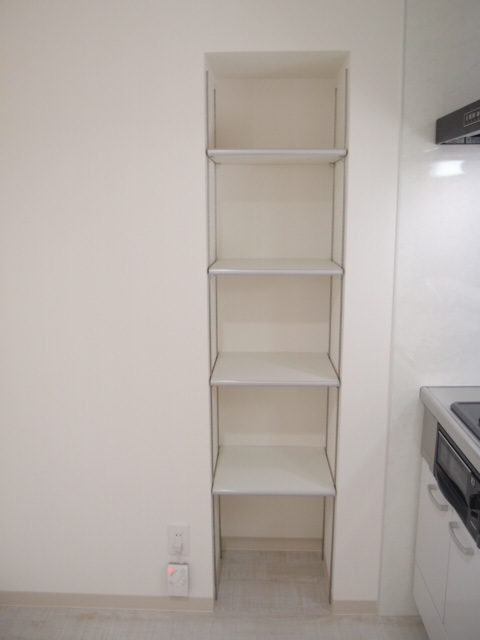 Kitchen. It is with shelves that can accommodate the kitchen supplies