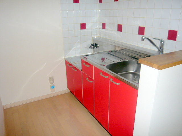 Kitchen. Red kitchen! You are independent! 