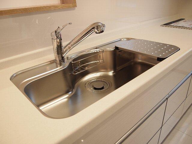 Other Equipment. Care easy because large sink also faucet is extended
