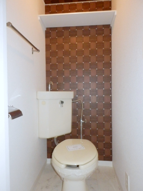 Toilet. It is beautifully cleaning being completed