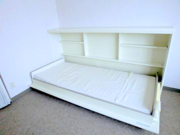 Living and room. It is with bed