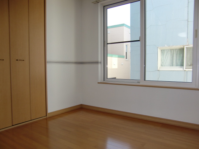 Other room space. It is bright and there is also a window