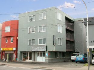 Building appearance. It is the top floor of the four-storey