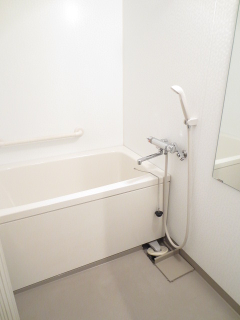 Bath. Comfortable, Stylish bath. Handrail with. 