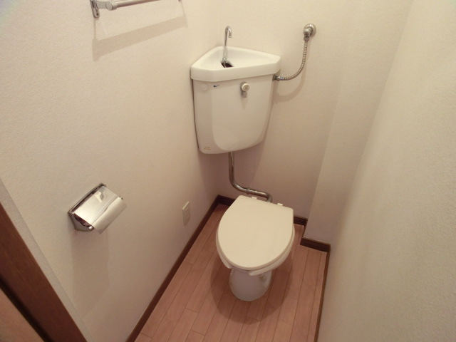 Toilet. Is a reference photograph of different in Room