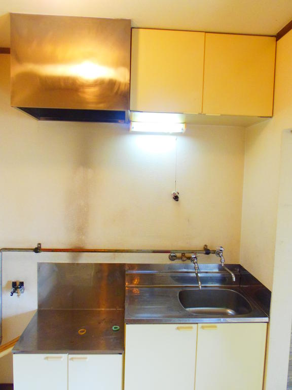 Kitchen. Exhaust Fan, Storage is also enhance the independent kitchen