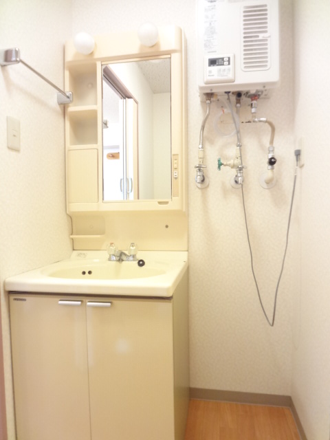 Washroom. There is also a washing machine storage in the washroom!