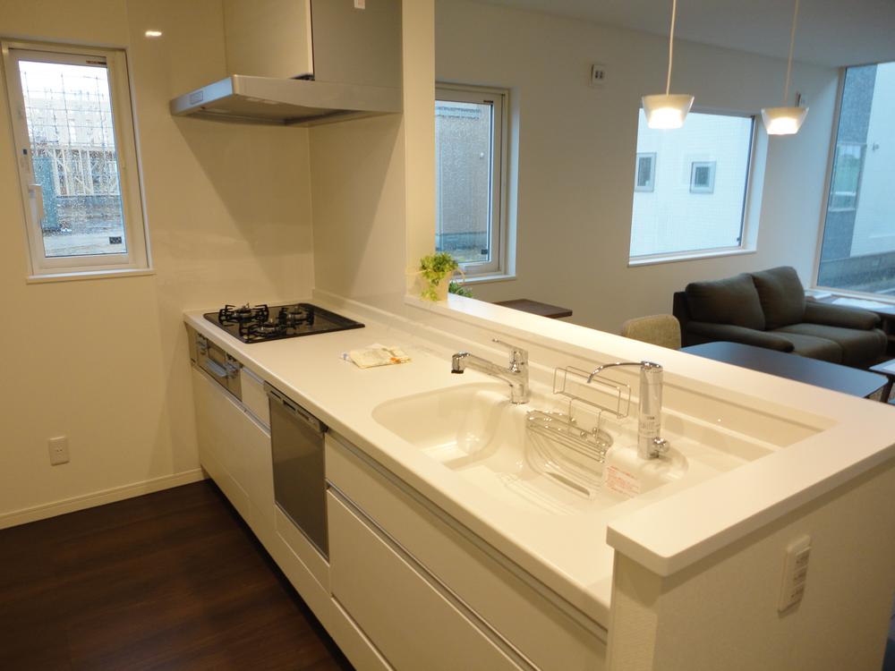 Kitchen. NEWS Local Kitchen. Kitchen overlooking the living room.