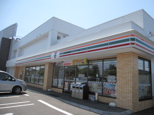 Convenience store. Seven-Eleven Sapporo shin kotoni Article 5 store up (convenience store) 456m