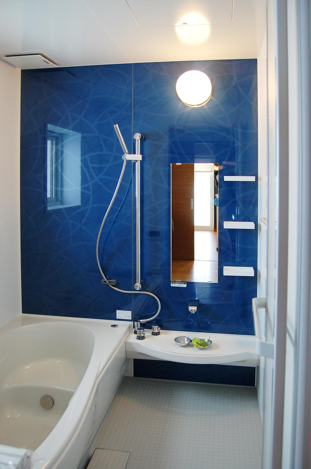 Bathroom. Bathroom that is a refreshing blue accent