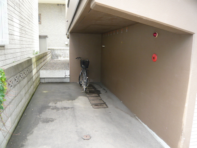 Parking lot. There is also a bicycle storage