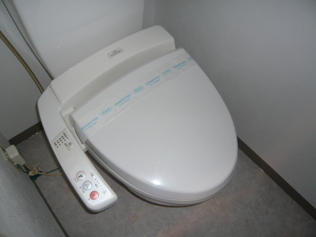 Toilet. Washlet is with